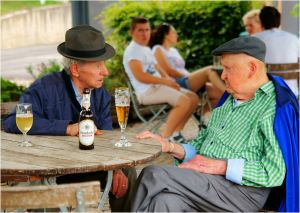 old men drinking beer